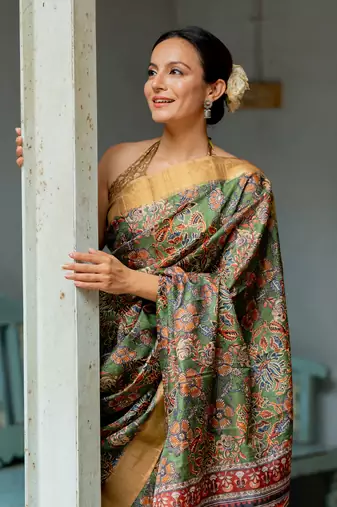 Green silk blend floral print golden zari border saree