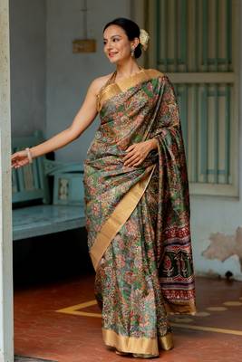 Green silk blend floral print golden zari border saree 1