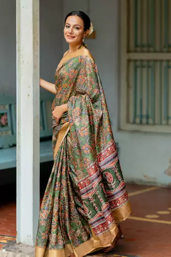 Green silk blend floral print golden zari border saree