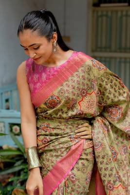 Light olive green silk blend ajrakh print floral print golden zari border saree 1