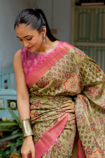 Light olive green silk blend ajrakh print floral print golden zari border saree