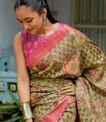 Light olive green silk blend ajrakh print floral print golden zari border saree