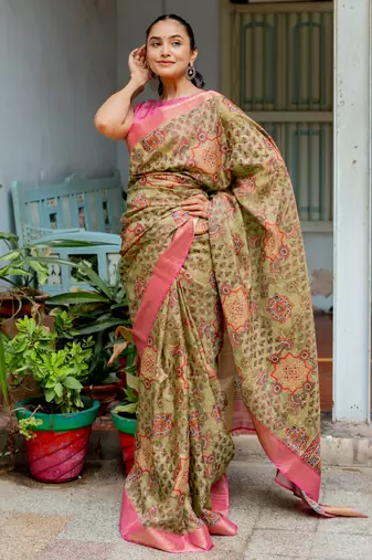Light olive green silk blend ajrakh print floral print golden zari border saree