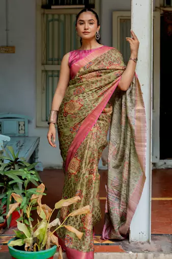 Light olive green silk blend ajrakh print floral print golden zari border saree