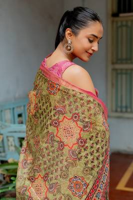 Light olive green silk blend ajrakh print floral print golden zari border saree 6