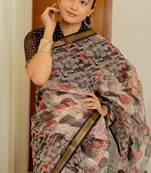 Cream kota doria polyester geometric print golden zari border saree