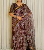 Light lavender kota doria polyester geometric print golden zari border saree