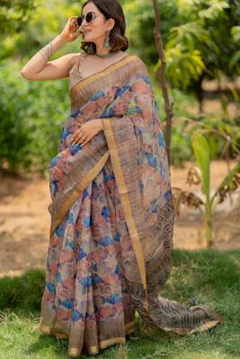 Light peach kota doria polyester floral print golden zari border saree 1