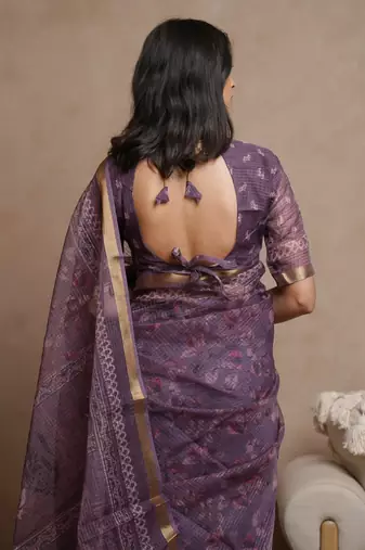Wine kota doria polyester floral print golden zari border saree