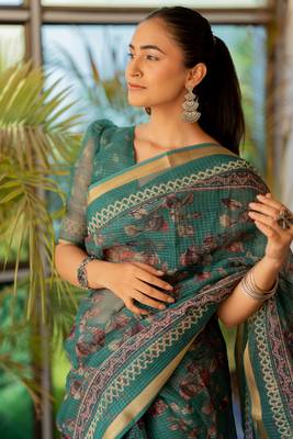 Teal kota doria polyester floral print golden zari border saree 1