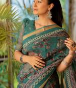 Teal kota doria polyester floral print golden zari border saree