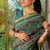 Teal kota doria polyester floral print golden zari border saree