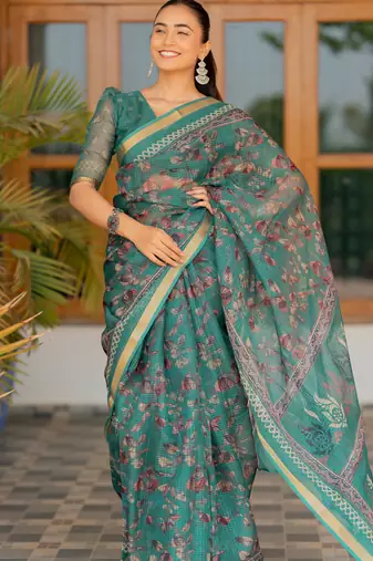 Teal kota doria polyester floral print golden zari border saree