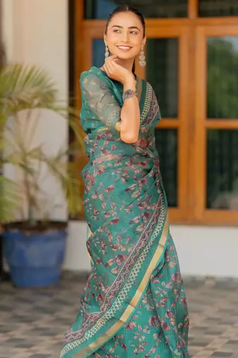Teal kota doria polyester floral print golden zari border saree