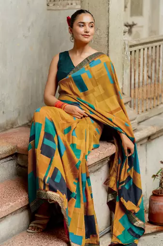 Mustard vichitra silk silk blend geometric print lace border saree