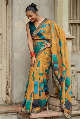 Mustard vichitra silk silk blend geometric print lace border saree 1