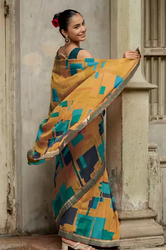 Mustard vichitra silk silk blend geometric print lace border saree