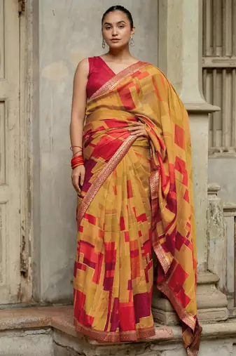 Mustard vichitra silk silk blend geometric print lace border saree