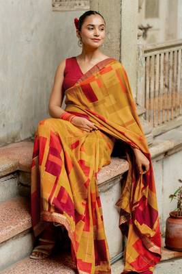 Mustard vichitra silk silk blend geometric print lace border saree 1