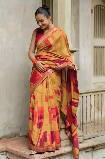 Mustard vichitra silk silk blend geometric print lace border saree
