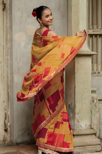 Mustard vichitra silk silk blend geometric print lace border saree