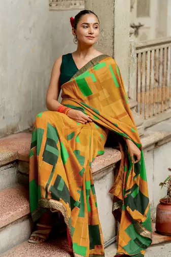 Mustard vichitra silk silk blend geometric print lace border saree