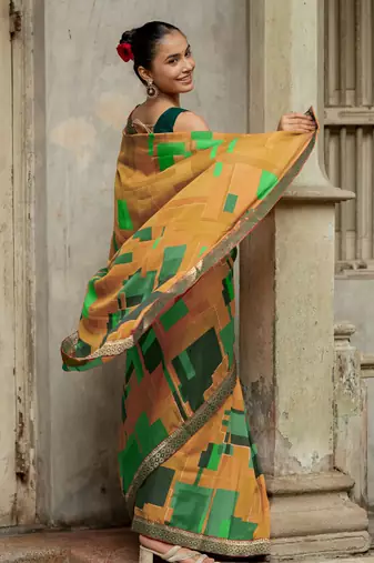 Mustard vichitra silk silk blend geometric print lace border saree