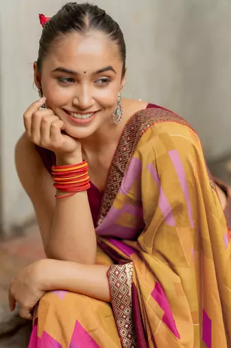Mustard vichitra silk silk blend geometric print lace border saree