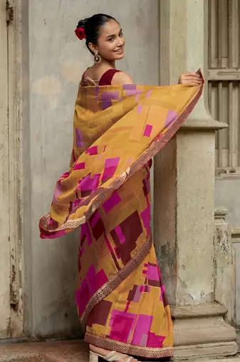 Mustard vichitra silk silk blend geometric print lace border saree