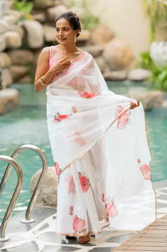 White organza floral print golden gota work golden border saree