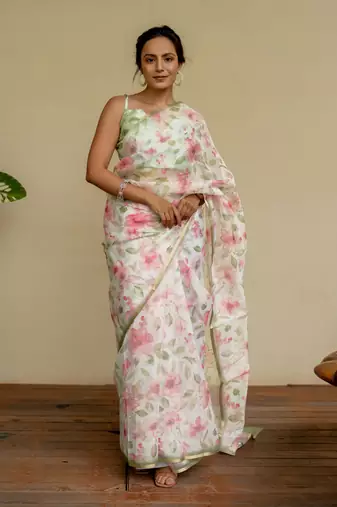 Off white organza floral print golden gota work golden border saree