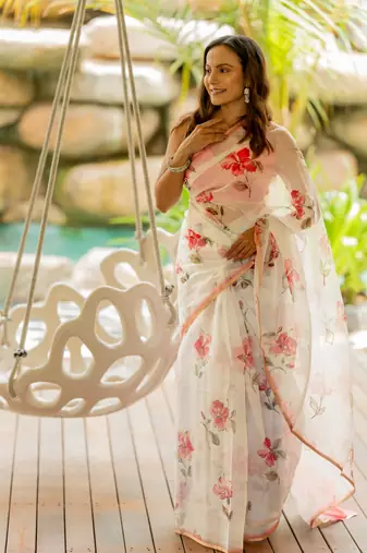 White organza floral print golden gota work golden border saree