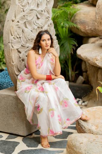 Off white organza floral print golden gota work golden border saree