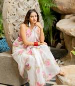Off white organza floral print golden gota work golden border saree