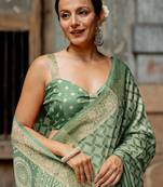 Dusty green silk blend geometric print golden woven border saree