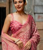 Coral pink silk blend geometric print golden woven border saree