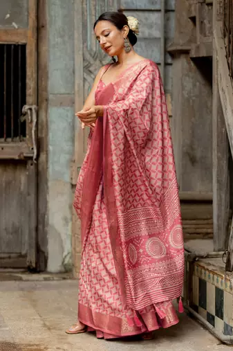 Coral pink silk blend geometric print golden woven border saree