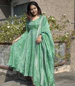 Fancy Twil Gold Net with Embroidery & 5mm Sequins, Tassels & Sleeves Anarkali Gown