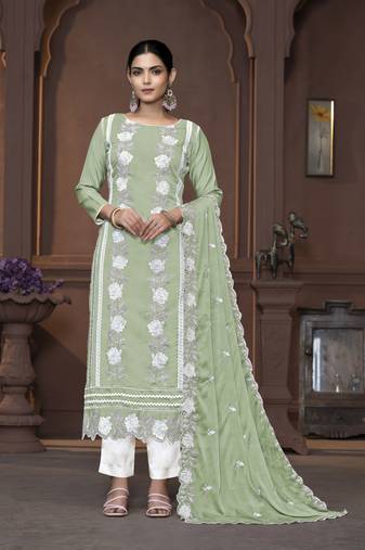 Women's green unstitched heavy thread embrodiery work roman silk dress material 