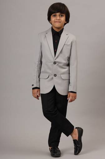 Light grey blazer with black trousers