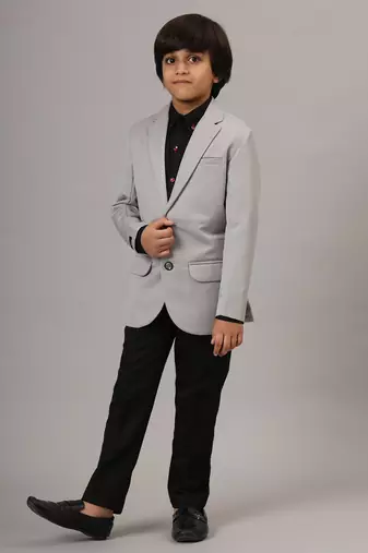 Light grey blazer with black trousers
