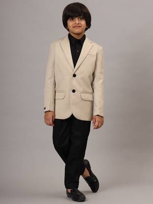 Beige blazer with black trousers 1