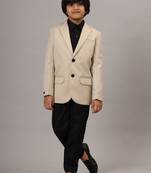 Beige blazer with black trousers
