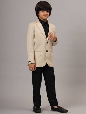 Beige blazer with black trousers 2