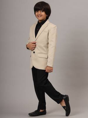 Beige blazer with black trousers 5