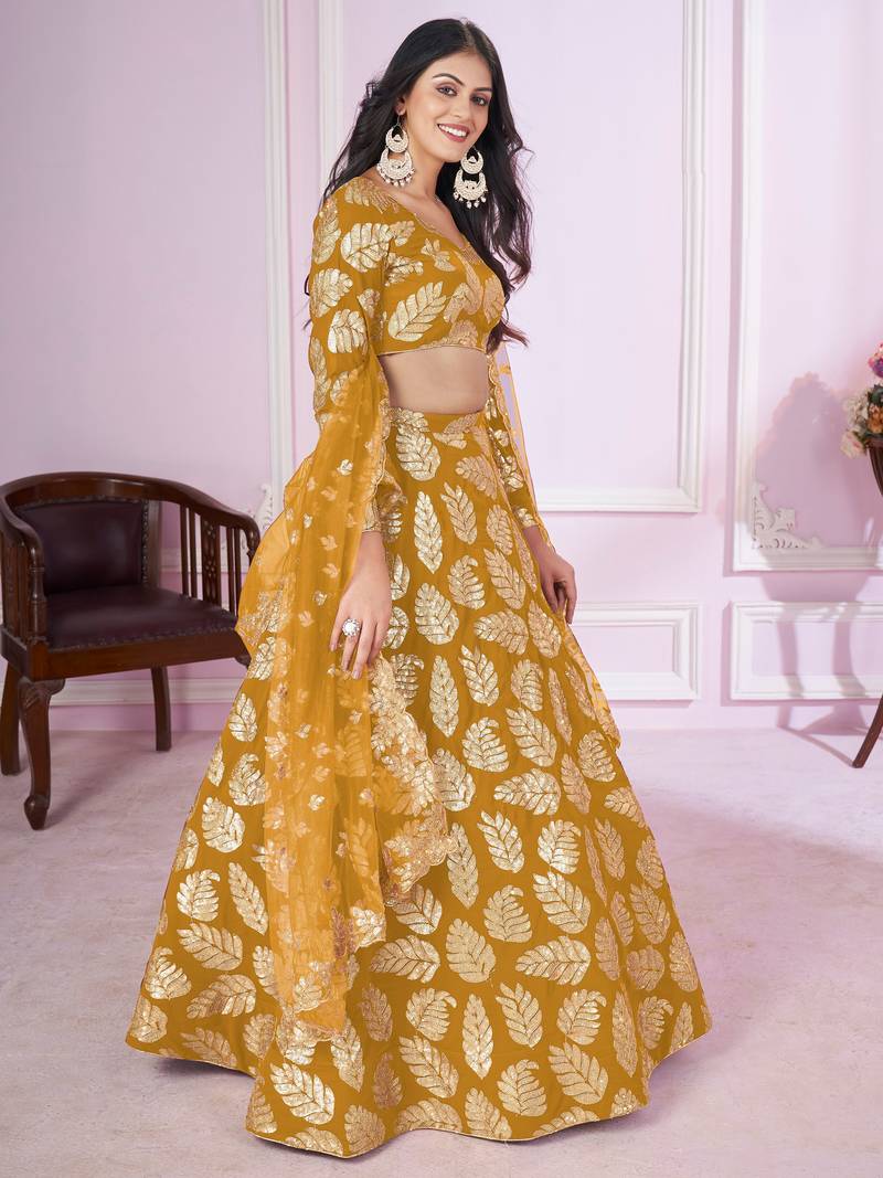 Attractive Yellow Sequins Georgette Wedding Lehenga Choli