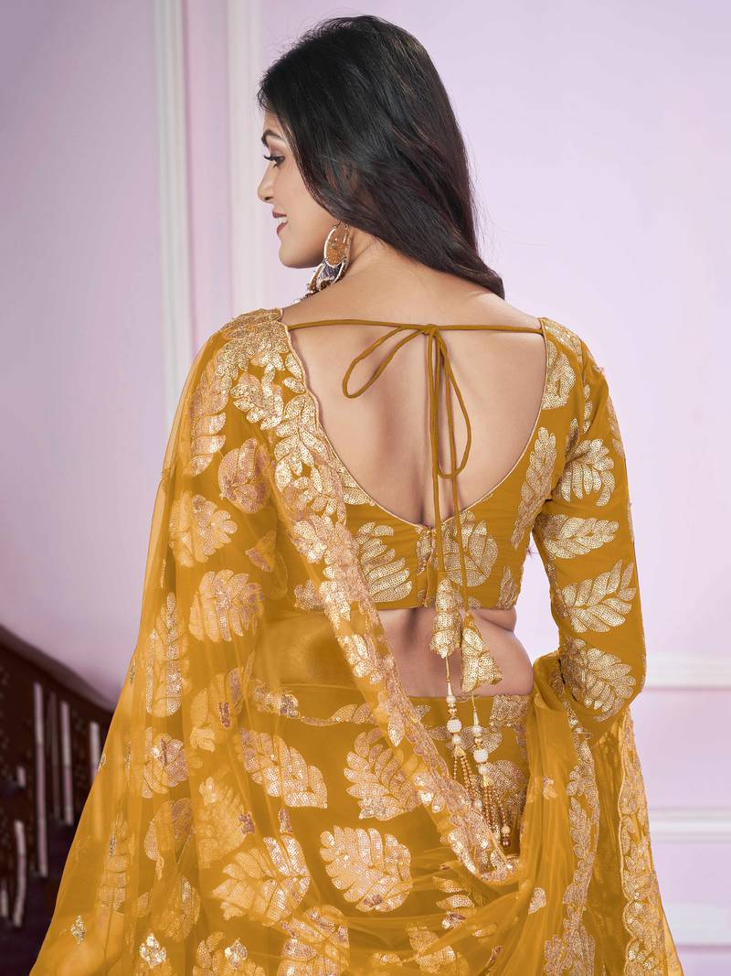 Attractive Yellow Sequins Georgette Wedding Lehenga Choli
