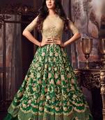 Beige embroidered net semi stitched anarkali lehenga suit.