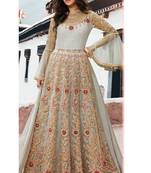 Grey embroidered net semi stitched anarkali lehenga suit.