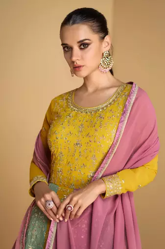 Mustard embroidered georgette free size stitched gown. ( size upto 42)